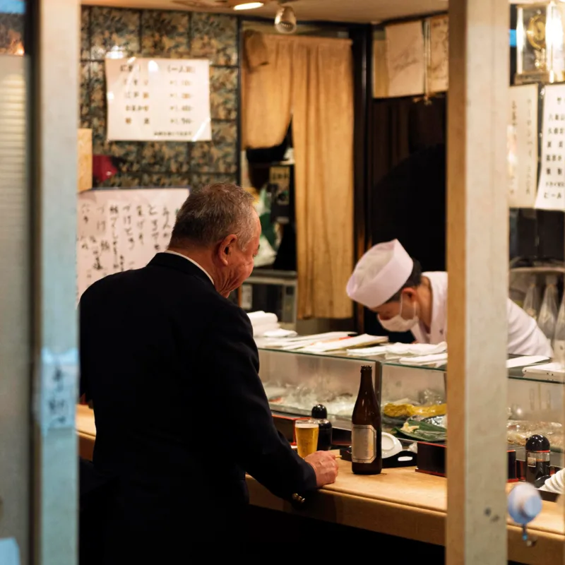 Kitchen order tablet beside food being prepared